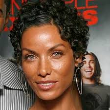 Nicole Murphy has run out of bounds with the IRS. According to public records, the IRS filed liens for $210,957 and $3,731 against the girlfriend of former ... - nicole_murphy-300x300