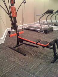 home gym with commercial carpet squares