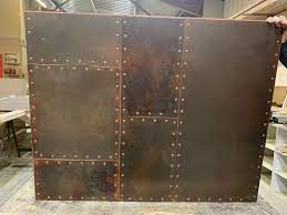 Riveted Aged Copper Panel Metal Wall