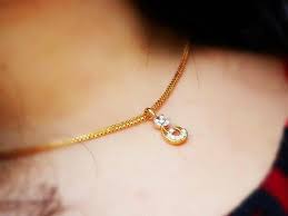 dainty gold pendant and chains
