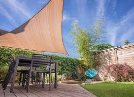 A backyard canopy provides more than shade from the summer sun. Patio Shades Ideas 10 Clever Ways To Take Cover Outdoors Bob Vila