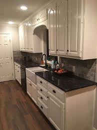 For a subdued, cool and calm look in your kitchen, go for muted white with a touch of pale green. 44 The Kitchen Backsplash With White Cabinets Dark Counter Game 41 Kitchenideas Kitchencabinet Whitecabinet Gentileforda Com Backsplash For White Cabinets Kitchen Design Black Appliances Kitchen