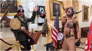 'qanon shaman' once had a career in the navy that ended over an. Qanon Shaman And Lectern Taker Charged Over Us Capitol Riots Stuff Co Nz