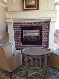 Brick Fireplaces With White Surround