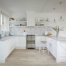 Kitchen backsplash ideas & designs for the modern kitchen. Caesarstone Clamshell Quartz Countertops Design Ideas