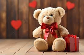 teddy bear in red gift box