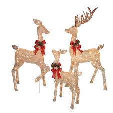 lighted bronze colored deer family