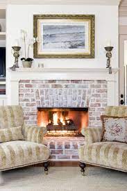 pale stone fireplaces and white mantel