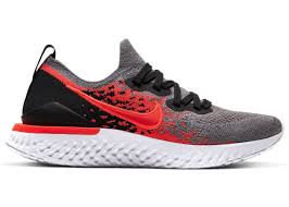 The black/grey is given a pop of color with a pink heel cage. Nike Epic React Flyknit 2 Cool Grey Bright Crimson Gs Aq3243 014