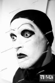 theatrical actor with dark mime makeup