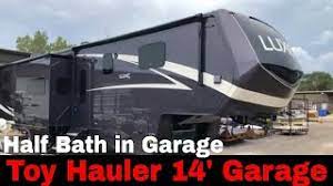 luxe toy hauler 44fb with half bath in