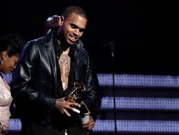grammys embrace of chris brown criticized