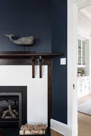 dark stained wooden fireplace mantel on