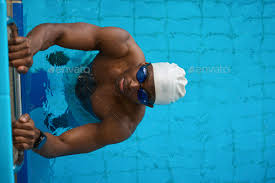 african american swimmer preparing for