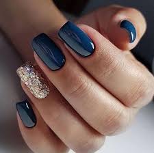Dream catcher nail art idea with blunt blue and black along with mixing brightness of white amidst the geometric nails looks fabulous. Elegant Navy Blue Nail Colors And Designs For A Super Elegant Look