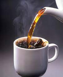 pouring hot coffee into mug license