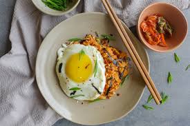 As a way to avoid wasting rice.15 frying nasi goreng was considered as part of the indies culture during the colonial period. Nasi Goreng Kimchi Oryza Grace