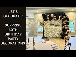 black and gold surprise 60th birthday