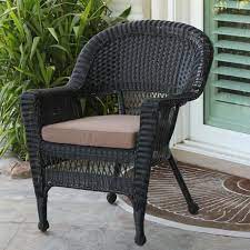 black wicker chair with brown cushion