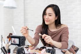 asian woman beauty vlogger doing