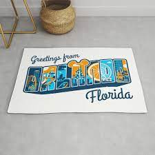 greetings from orlando florida rug by