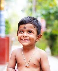 smiling indian child free stock photo