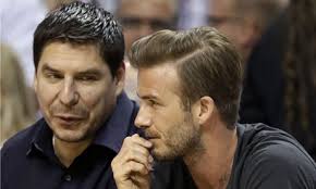 David Beckham, watches Miami Heat, with Marcelo Claure, founder of Brightstar Corp., on a fact-finding visit to Florida. Photograph: Lynne Sladky/AP - David-Beckham-Marcelo-Cla-008