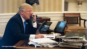 Image result for trump working in oval office