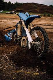 blue motocross dirt bike on mud free