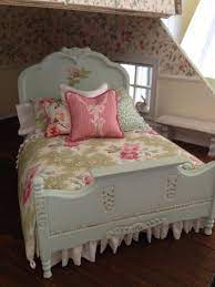 pale bluish green painted bed with