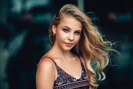 I think the tan skin with blonde hair cuz black hair look blah and blonde hair is shiny.i think mostly guy will like woman with tan skin and blonde hair. Hd Wallpaper Women Blonde Face Blue Eyes Long Hair Tanned Women Outdoors Wallpaper Flare