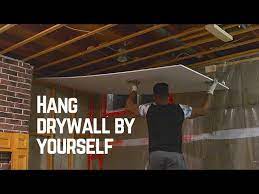 How I Hung Drywall On A Ceiling Alone