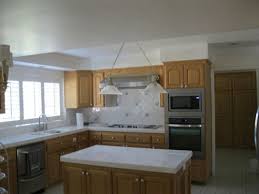Green is a good fit in these kitchens because oak wood has a yellow undertone. Help Best Paint Color With Oak Cabinets