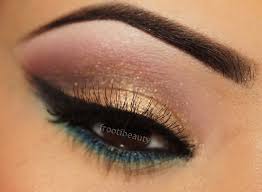 gold maroon with green blue makeup look
