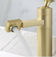brassed gold widespread bathroom faucet