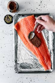 Place the salmon filets on the baking sheet, skin sides down. Easy Mustard Salmon With Citrus Squash Salad A Simple Pantry