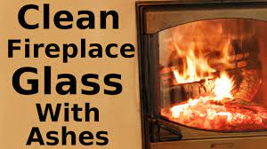how to clean fireplace glass with ashes