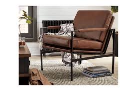 Chairs are often thought of as functional items. Puckman Accent Chair Ashley Furniture Homestore In 2021 Brown Accent Chair Accent Chairs Accent Chairs For Living Room