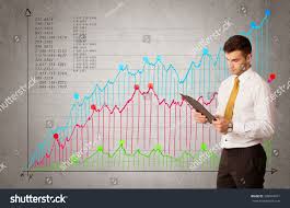 Confident Young Businessman Standing Front Chart Stock Photo