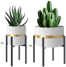 Discover plant stands for indoors and outdoors with unique design ideas. Bcyoup Metal Plant Stand Indoor Black Mid Century Modern Plant Holder Adjustable 8 To 12 Inch Display Corner Potted Tall Plant Pot Stand Outdoor Indoor Matte Black Flower Stand For Home Office Decor Patio