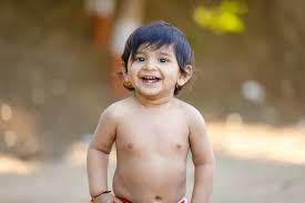 cute indian baby boy stock photo by