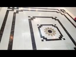 White cabinetry, neutral tiled walls and a tiled floor all work nicely together in this bathroom. 3d Floral Marble Floor Design Border Strip By Decorated Tiles And Marble Designs