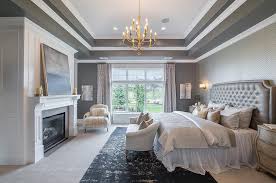 gray bedroom with tray ceiling