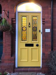 hardwood front door with stained glass