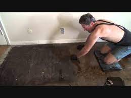 removing black tar flooring mastic