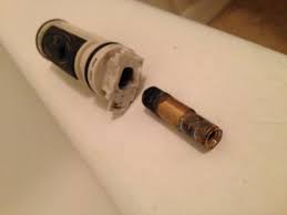 removing moen bathtub valve with a