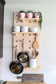 From displaying to organization, this rack can absolutely keep your kitchen clean and attractive. Free Up Cabinet Space With A Diy Wall Mounted Pot Rack Room Makeovers To Suit Your Life Hgtv