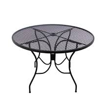 Wrought iron furniture, that are usually used for patio and garden decorating, come into modern homes, creating a new trend in interior decorating with metal chairs and benches. Arlington House Glenbrook 48 In Black Round Patio Dining Table 8349000 0105000 The Home Depot