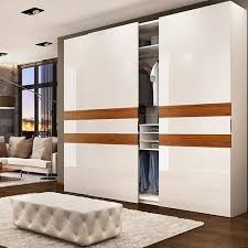 white wooden 3 door sliding wardrobe