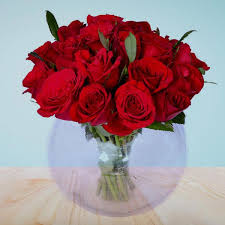 romantic red roses in round gl vase
